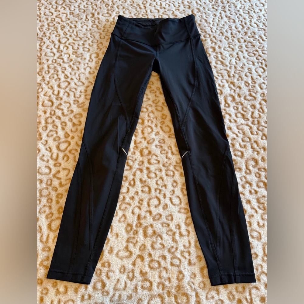 Lululemon Athletica Black Leggings with Zipper Pocket
Women’s Size: 4